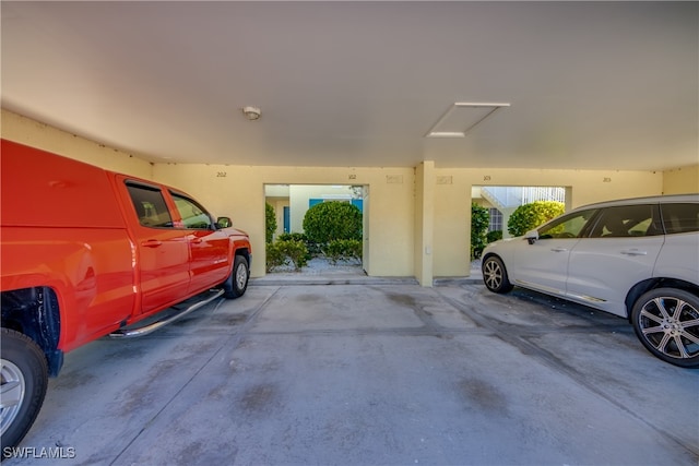 garage with a carport