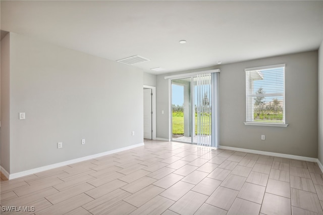 empty room featuring light hardwood / wood-style floors