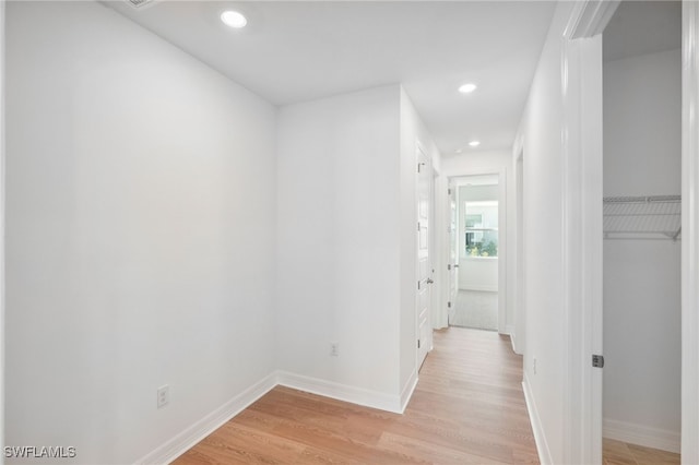 corridor featuring light hardwood / wood-style flooring