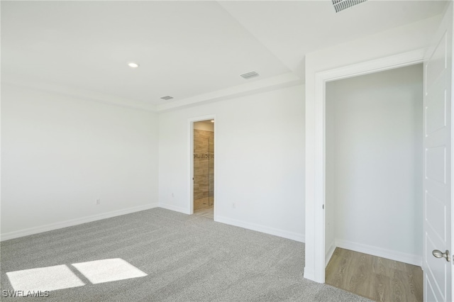 empty room with light colored carpet