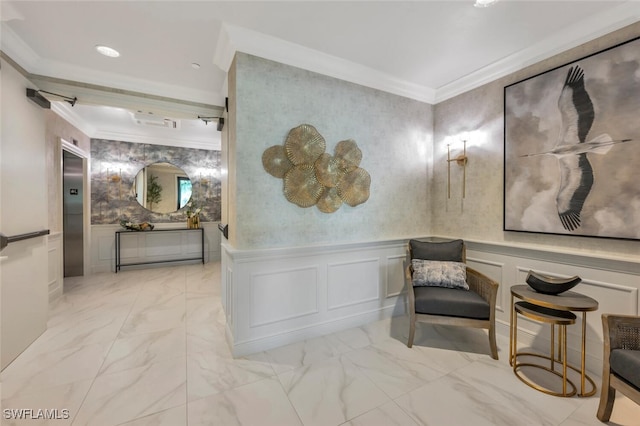 interior space featuring marble finish floor, a wainscoted wall, crown molding, and wallpapered walls