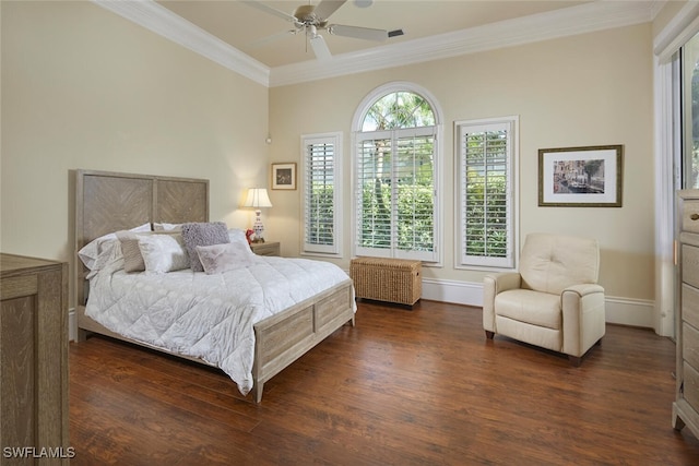 bedroom with ceiling fan, ornamental molding, and dark hardwood / wood-style flooring