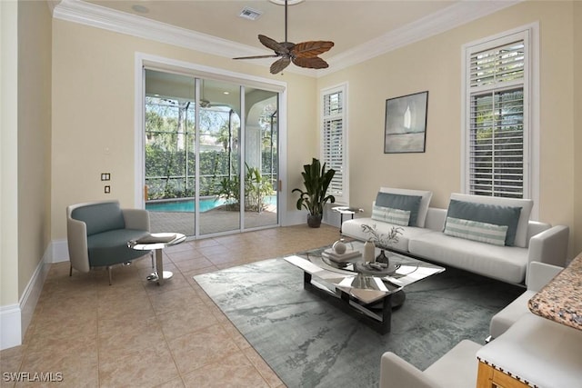 tiled living room featuring a ceiling fan, baseboards, visible vents, and crown molding