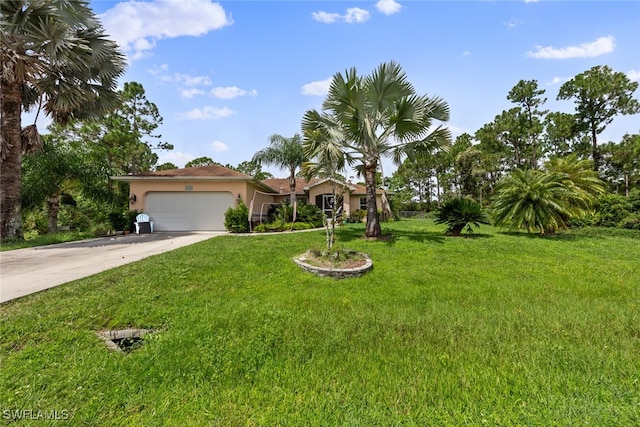 mediterranean / spanish-style home featuring a front lawn and a garage