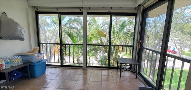 unfurnished sunroom featuring a wealth of natural light