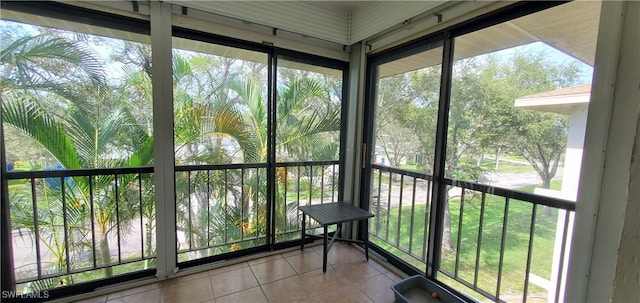 unfurnished sunroom featuring plenty of natural light