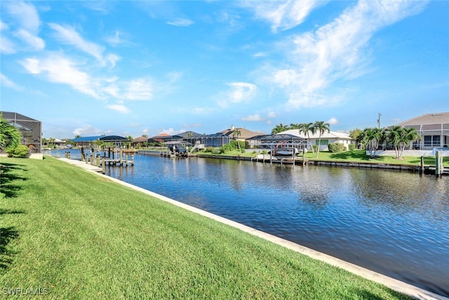 view of water feature with a boat dock and a residential view