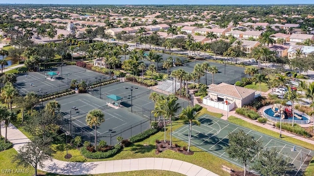 birds eye view of property with a residential view