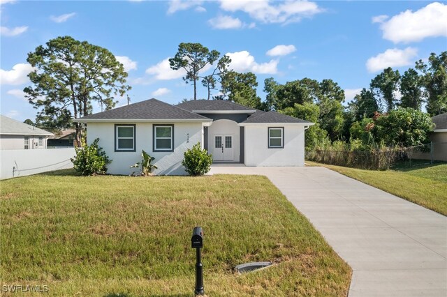 ranch-style house with a front yard