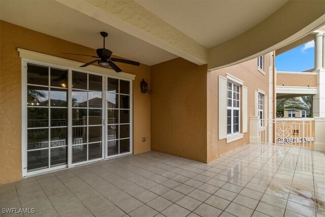 view of patio with ceiling fan