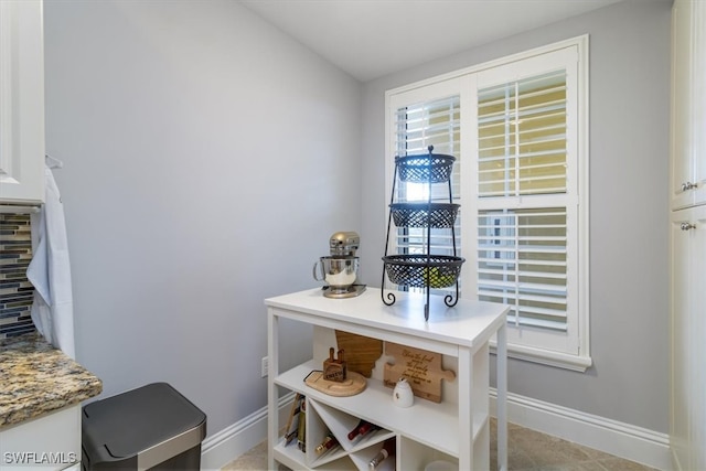 interior space featuring light tile patterned flooring