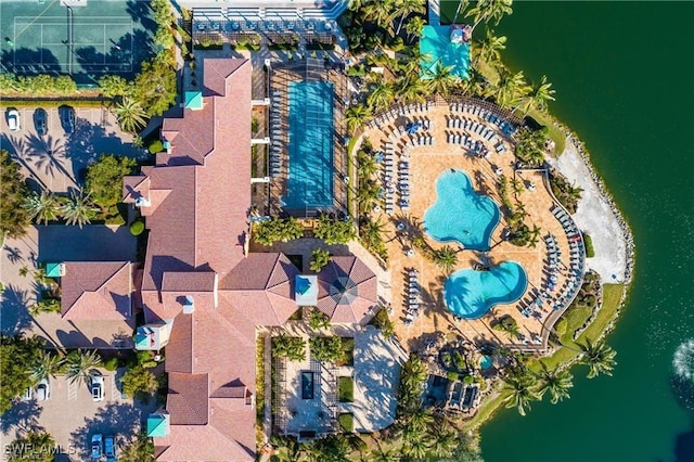 birds eye view of property featuring a water view