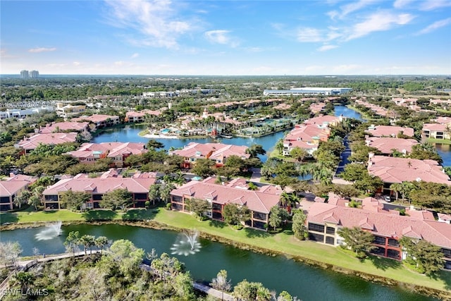 bird's eye view featuring a water view and a residential view