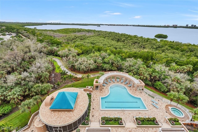 view of pool featuring a water view