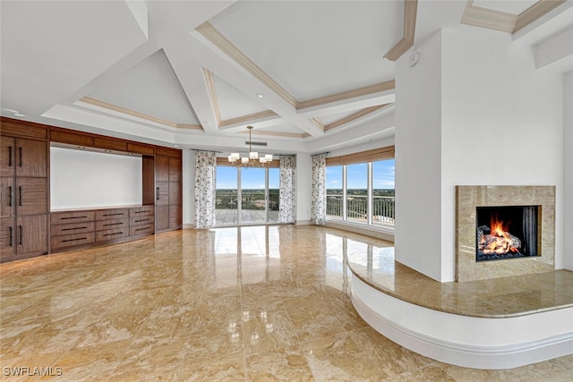 unfurnished living room with a chandelier, coffered ceiling, a fireplace, marble finish floor, and beamed ceiling