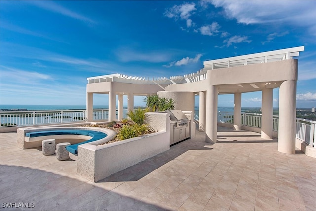 view of patio / terrace featuring a water view, fence, grilling area, and a pergola