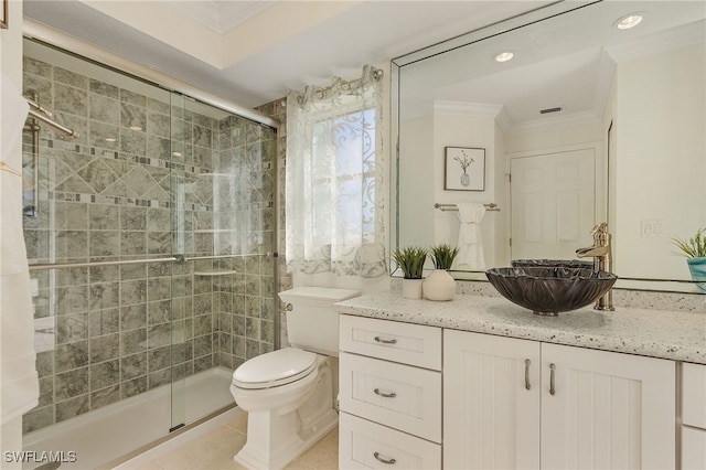 bathroom featuring vanity, toilet, walk in shower, and tile patterned floors