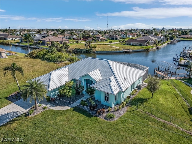 drone / aerial view featuring a water view