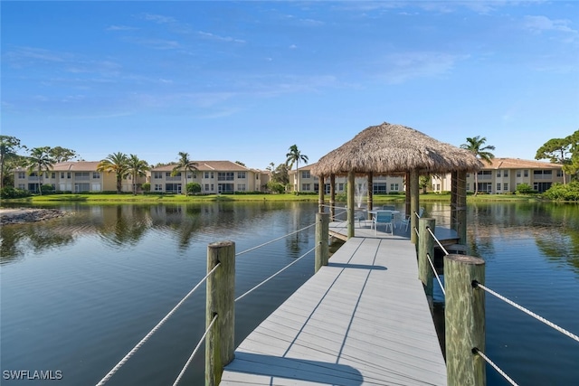 dock area featuring a gazebo and a water view