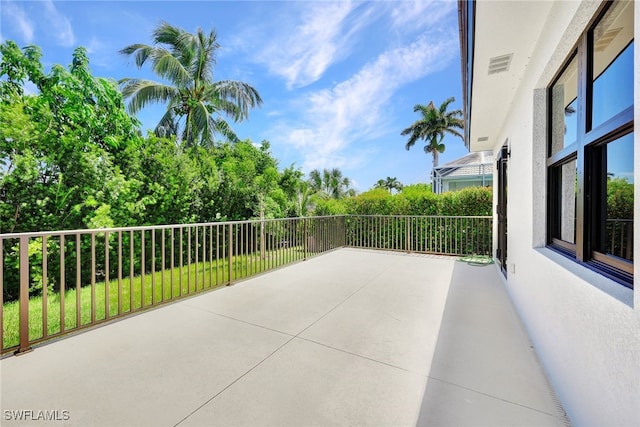 view of patio / terrace with a balcony