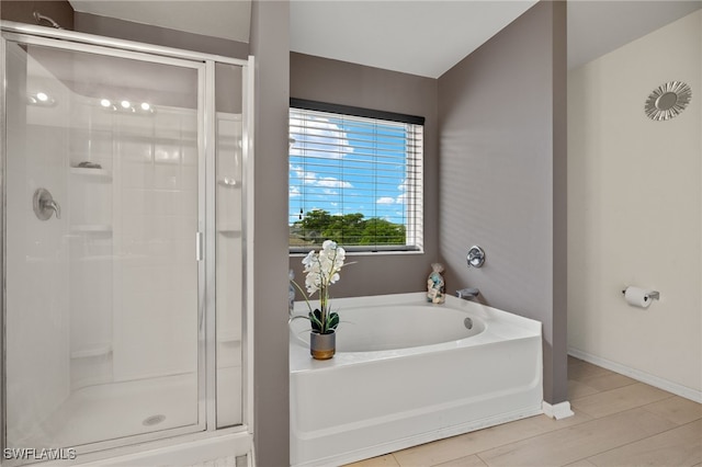 bathroom with independent shower and bath