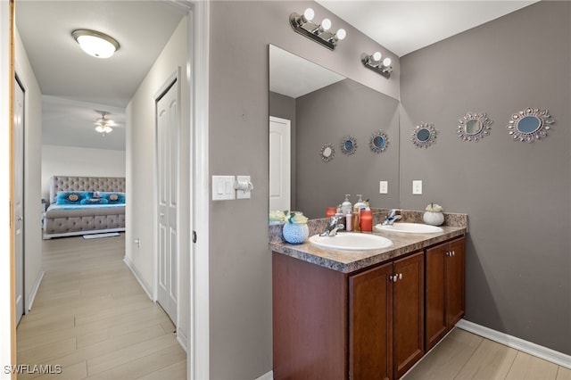 bathroom featuring dual vanity