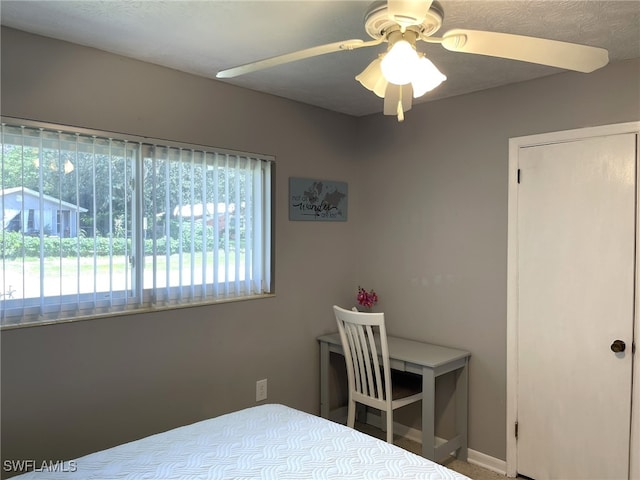 bedroom featuring ceiling fan