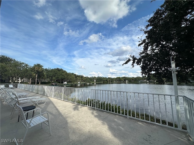 view of patio featuring a water view