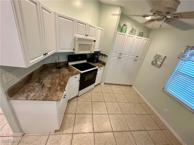 kitchen with white cabinets, light tile patterned floors, white appliances, and ceiling fan