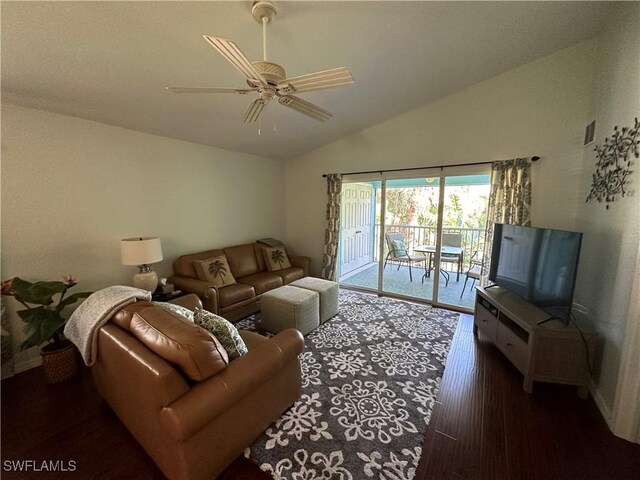 living room featuring ceiling fan, wood-type flooring, and lofted ceiling