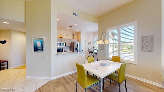 dining area featuring light hardwood / wood-style floors