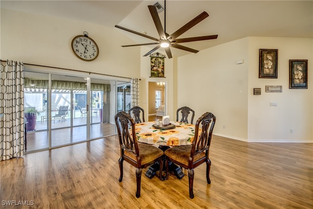 dining room featuring a wealth of natural light, ceiling fan, and hardwood / wood-style flooring