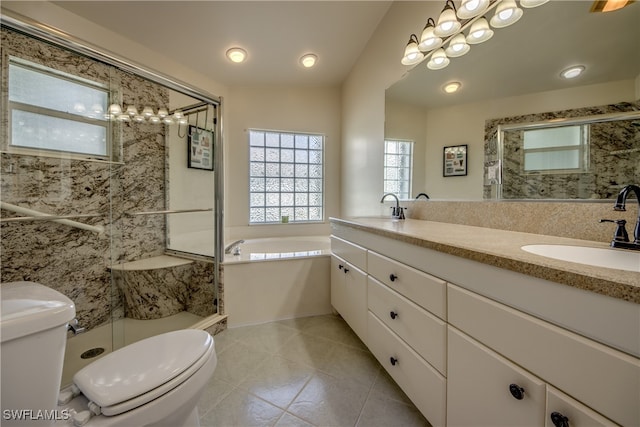 full bathroom with shower with separate bathtub, toilet, dual bowl vanity, and tile patterned flooring