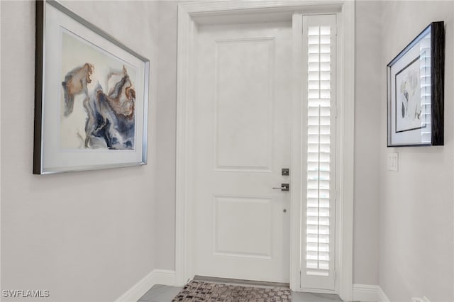 foyer with tile patterned flooring