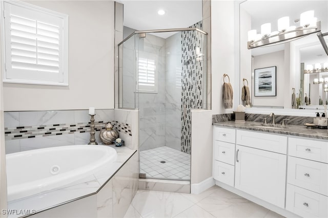 bathroom with tile patterned flooring, plus walk in shower, and vanity