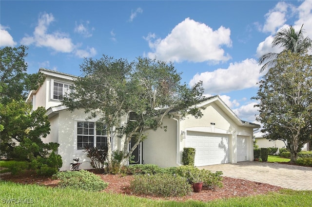 view of front of property with a garage