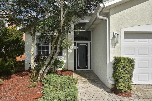 entrance to property with a garage