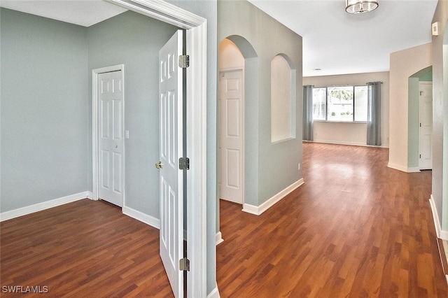 corridor featuring hardwood / wood-style flooring