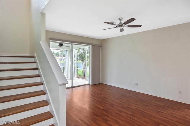 interior space with ceiling fan and wood-type flooring