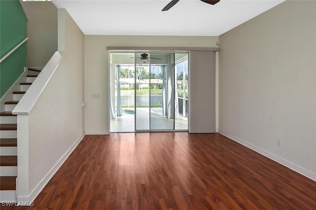 unfurnished room with ceiling fan and wood-type flooring