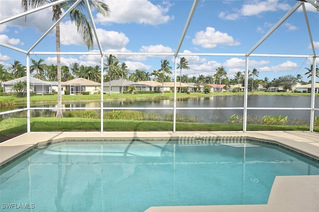 view of swimming pool with a lanai