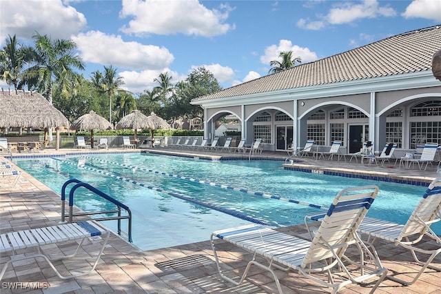 view of swimming pool with a patio