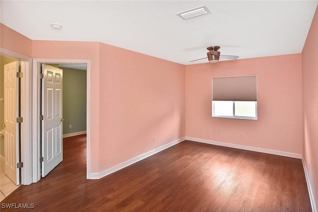 unfurnished room featuring ceiling fan and hardwood / wood-style floors