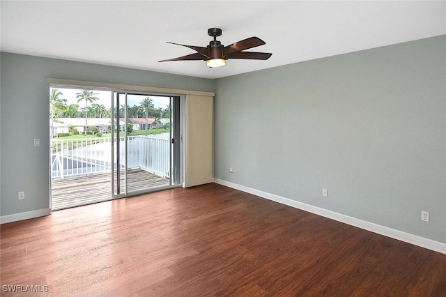 unfurnished room featuring ceiling fan and wood-type flooring