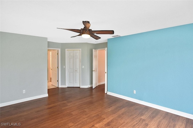 spare room featuring ceiling fan and hardwood / wood-style floors