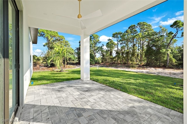 view of patio / terrace featuring ceiling fan