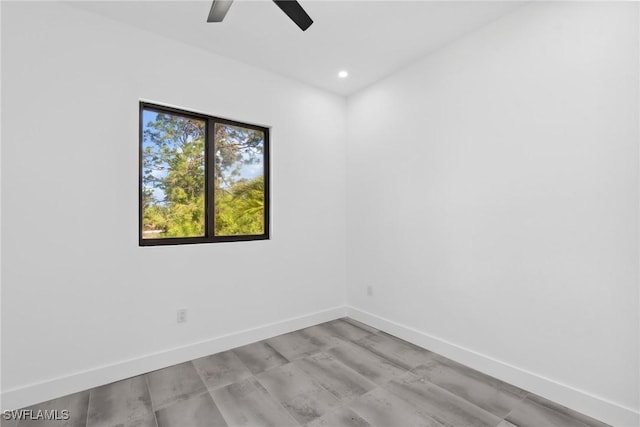 unfurnished room featuring light wood-style flooring, baseboards, a ceiling fan, and recessed lighting