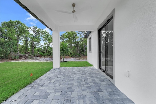 view of patio with ceiling fan