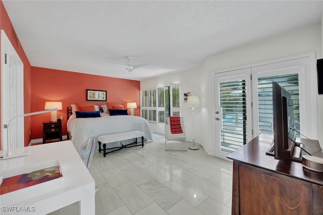 bedroom with ceiling fan and access to outside