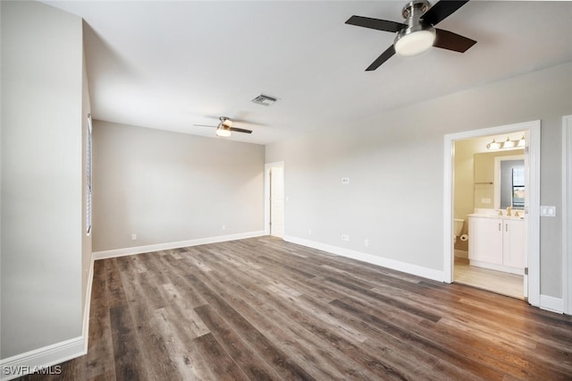 unfurnished room featuring ceiling fan and hardwood / wood-style floors